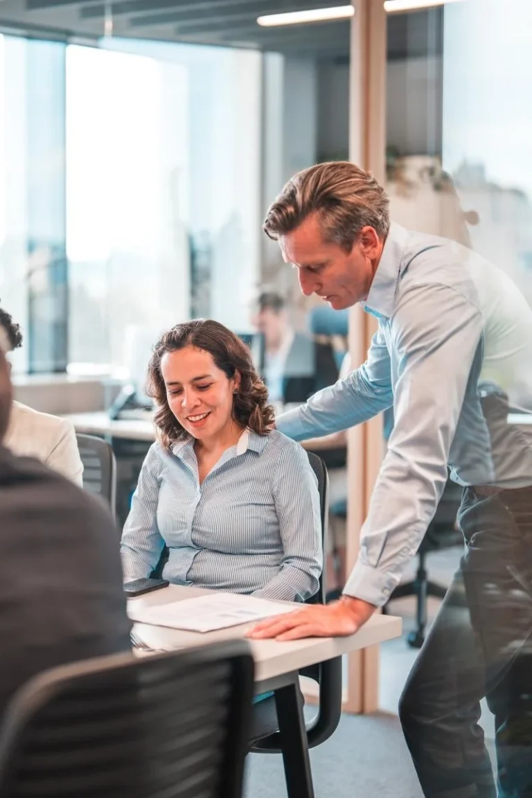 a-group-of-people-working-in-an-office